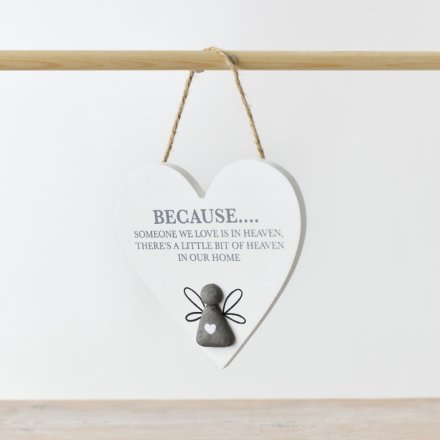 Heart-shaped hanging plaque with text and angel figure on a white background