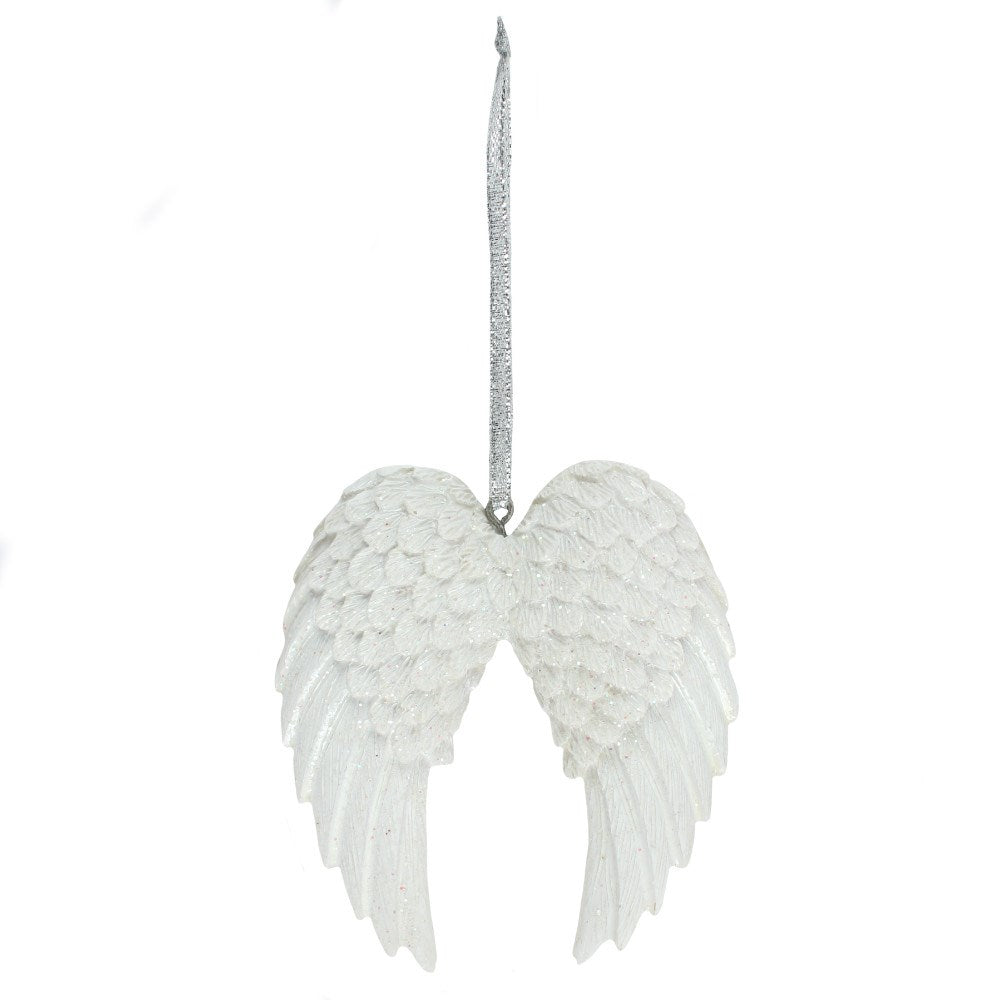 White angel wings ornament on a white background