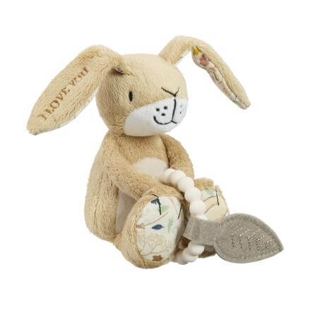 Plush toy rabbit with a white teething ring attached on a white background