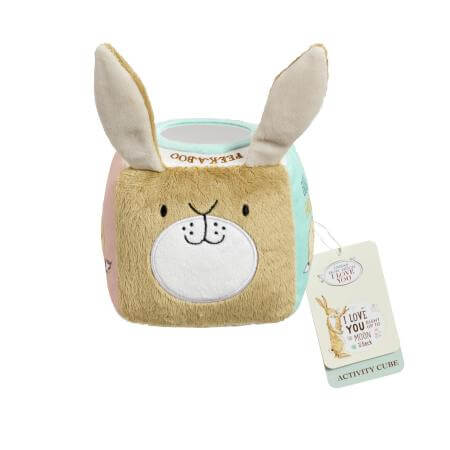 Plush toy activity cube with bunny ears and a tag on a white background