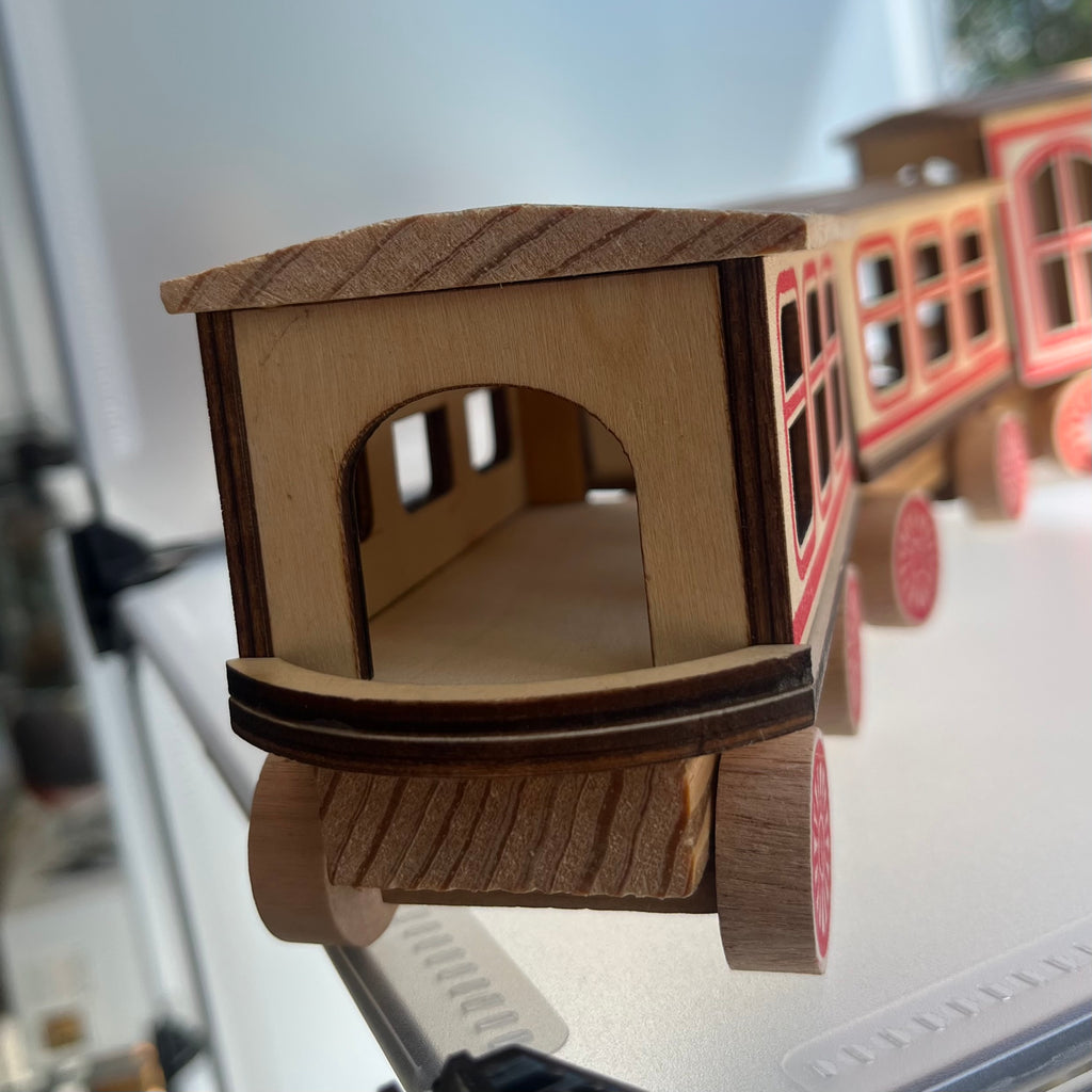 Back carriage on wooden toy train set