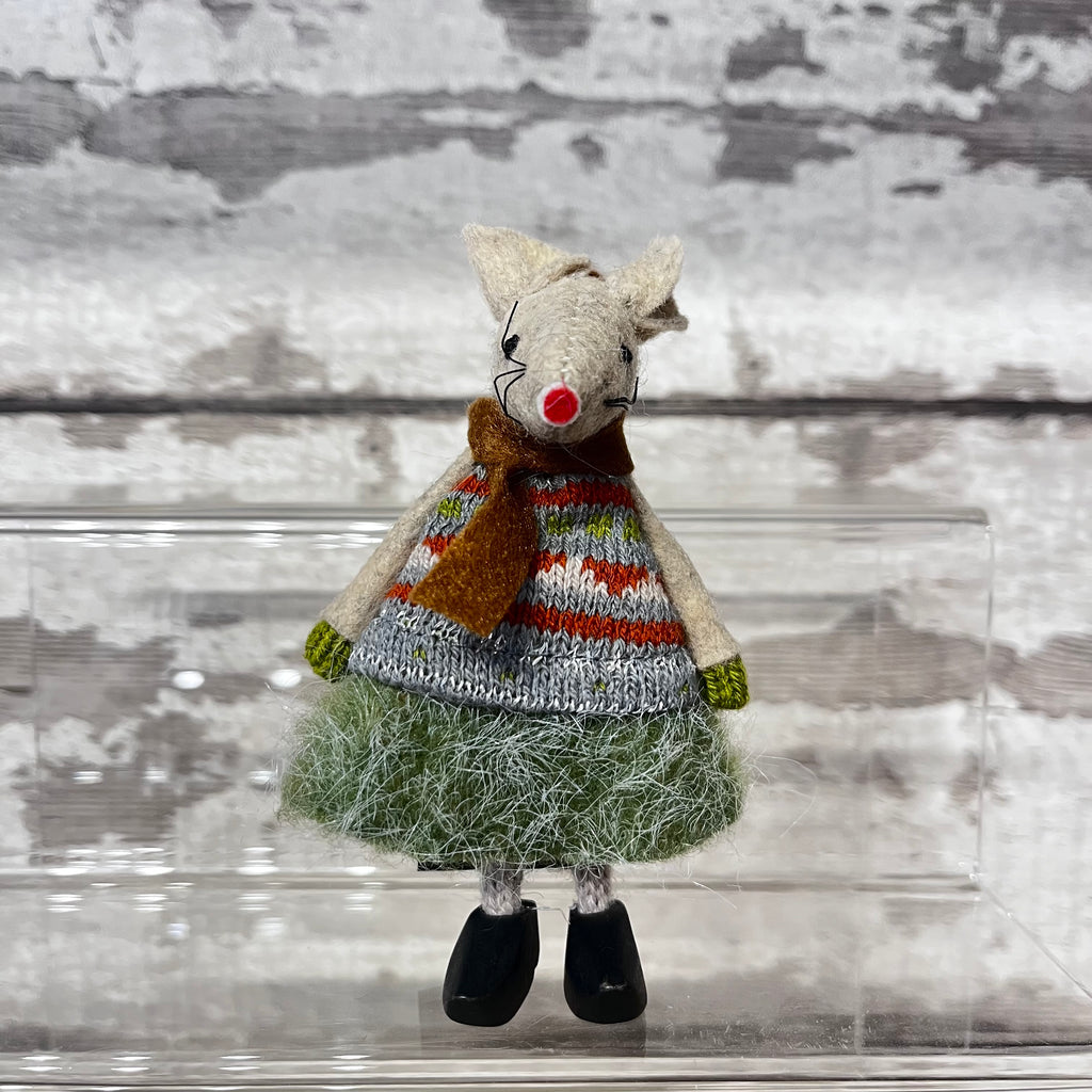 Fabric mouse decoration with knitted jumper, skirt, and wooden clogs.