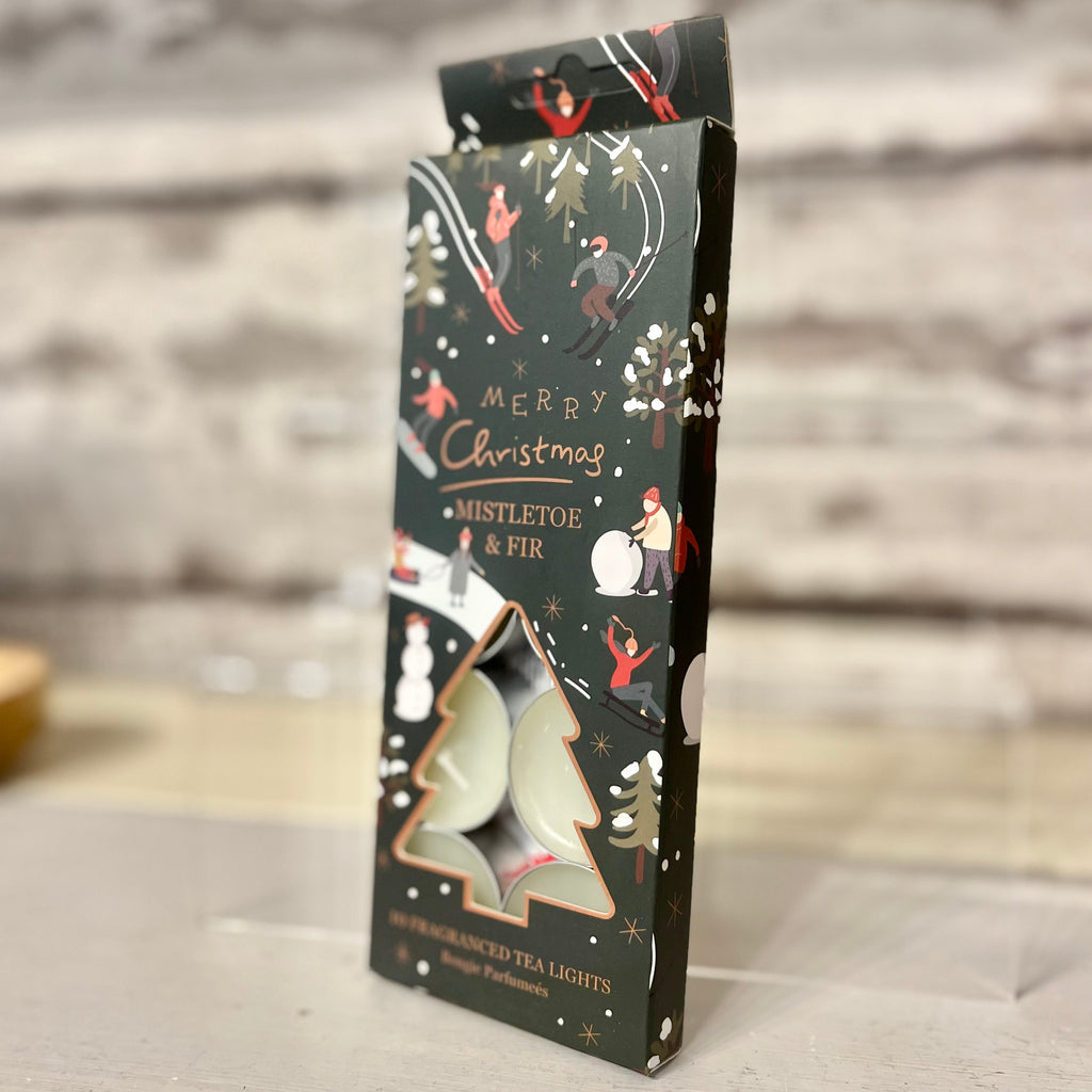 Packaging of tea lights with Christmas design on a neutral background