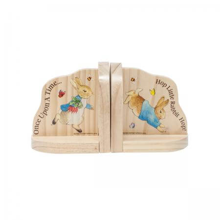Exposed wooden bookens with colourful printed Peter Rabbit designs on the sides of each bookend.