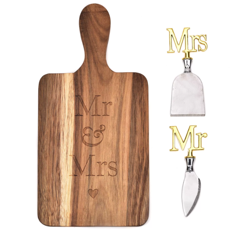 Wooden paddle board with handle engraved with 'mr & mrs' with matching individual 'mr' and 'mrs' cheese knives