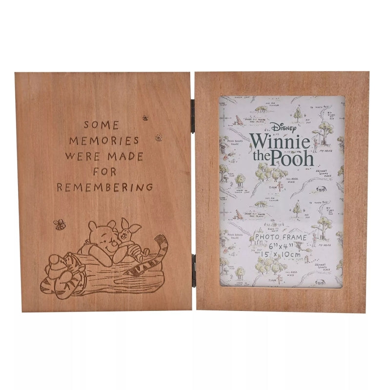 Wooden photo frame with 'Winnie the Pooh' design and text on a white background