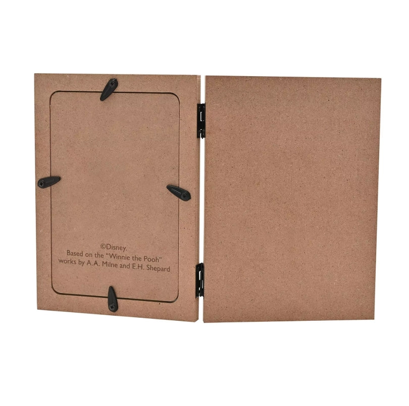 Brown reverse side of photo frame with black hinges and Disney branding on a white background