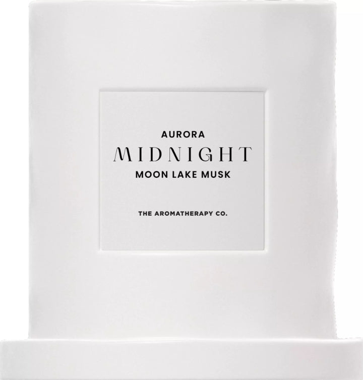 White packaging with black text for Aurora Midnight Moon Lake Musk by The Aromatherapy Co.