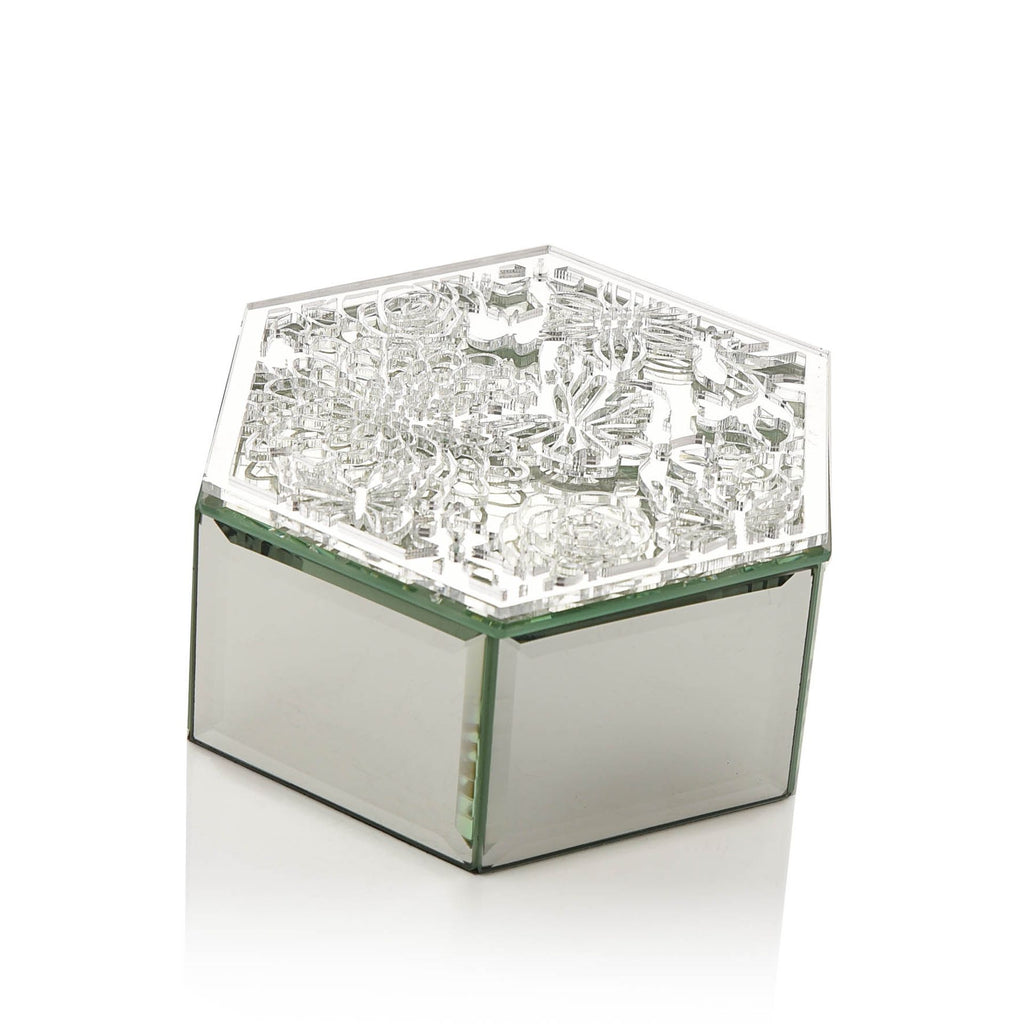 Hexagonal mirrored trinket box with intricate butterfly and floral design on top. 