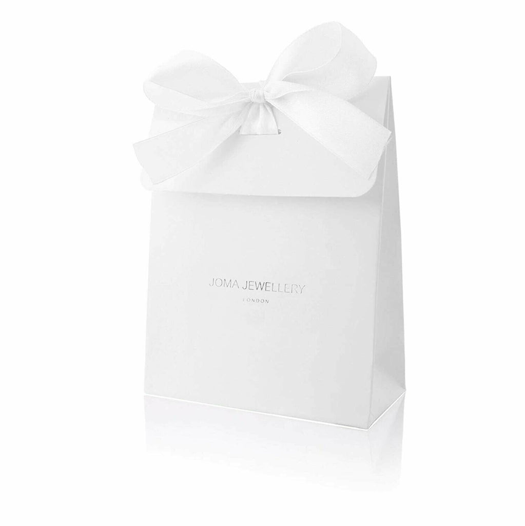 White gift bag with bow on a white background